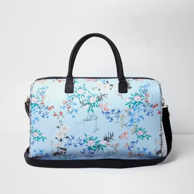 Blue floral and snake print weekend bag